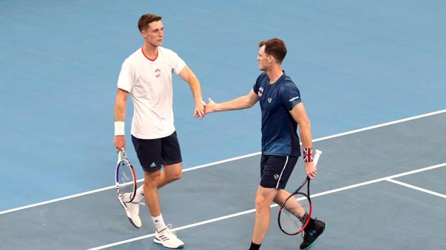 Britain's Joe Salisbury and Jamie Murray celebrate during their Group C doubles match against Moldova's Radu Albot and Alexander Cozbinov. (REUTERS) Britain's Joe Salisbury and Jamie Murray celebrate during their Group C doubles match against Moldova's Radu Albot and Alexander Cozbinov. (REUTERS)