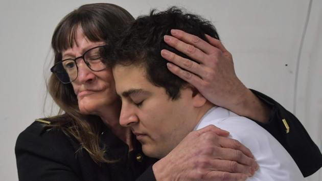 Denise Vicentin embraces Doctor Rodrigo Salazar. Next year, Dib and Salazar plan to open a treatment centre for facial prosthetic rehabilitation built by Paulista University and a non-profit organisation which they founded, called Plus Identity. They have a waiting list of potential patients. Eventually, Dib hopes 3D printing can be used to make the actual silicone prostheses. (Nelson Almeida/AFP) Denise Vicentin embraces Doctor Rodrigo Salazar. Next year, Dib and Salazar plan to open a treatment centre for facial prosthetic rehabilitation built by Paulista University and a non-profit organisation which they founded, called Plus Identity. They have a waiting list of potential patients. Eventually, Dib hopes 3D printing can be used to make the actual silicone prostheses. (Nelson Almeida/AFP)