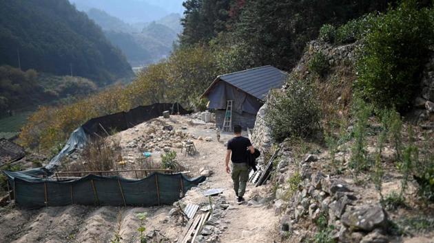 The number of people under the poverty line in rural China has reduced from 700 million in 1978 to 16.6 million in 2018, according to government figures. But the depopulation of the countryside continues, as many head to cities for jobs. “We want to be an example, to show young people that it is entirely possible to set up a business and earn money in rural areas,” explained the university-educated Ma Gongzuo. (Wang Zhao/AFP) The number of people under the poverty line in rural China has reduced from 700 million in 1978 to 16.6 million in 2018, according to government figures. But the depopulation of the countryside continues, as many head to cities for jobs. “We want to be an example, to show young people that it is entirely possible to set up a business and earn money in rural areas,” explained the university-educated Ma Gongzuo. (Wang Zhao/AFP)