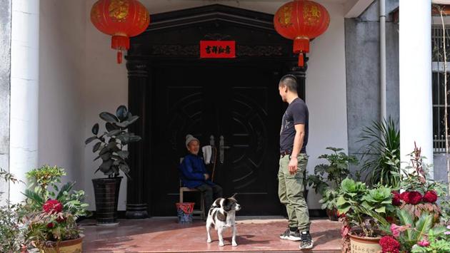 Ma Gongzuo (R) talks to his grandfather. China is home to the world’s largest market for live video broadcasting, according to audit firm Deloitte. Some 847 million access the internet via their smartphone in the country. “It’s progress,” Ma’s father Ma Jianchun said happily. “We old people are overwhelmed. With the money, we’ve been able to renovate our house,” he said to AFP. (Wang Zhao/AFP) Ma Gongzuo (R) talks to his grandfather. China is home to the world’s largest market for live video broadcasting, according to audit firm Deloitte. Some 847 million access the internet via their smartphone in the country. “It’s progress,” Ma’s father Ma Jianchun said happily. “We old people are overwhelmed. With the money, we’ve been able to renovate our house,” he said to AFP. (Wang Zhao/AFP)