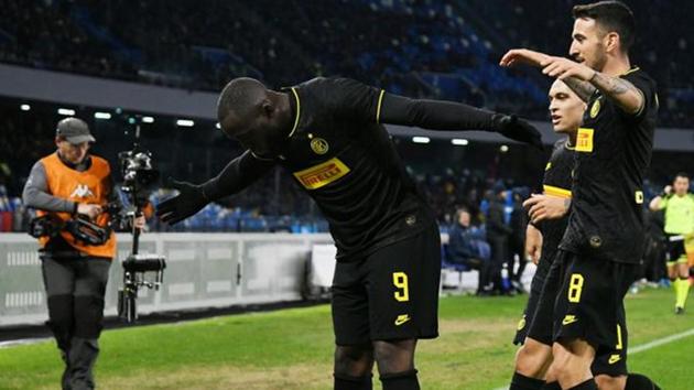 Lazio players cheer after scoring during the Italian Serie A