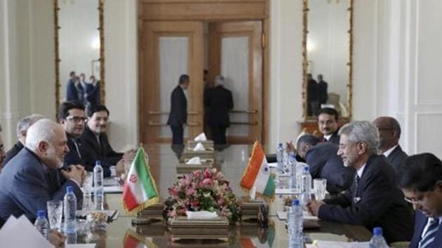Zarif and Jaishankar talk during a bilateral meeting. (PTI) Zarif and Jaishankar talk during a bilateral meeting. (PTI)