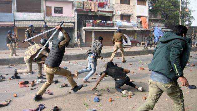 Police personnel baton charge on the demonstrators as the protest against Citizenship Amendment Act 2019 turned violent in Lucknow on Thursday. (ANI file photo) Police personnel baton charge on the demonstrators as the protest against Citizenship Amendment Act 2019 turned violent in Lucknow on Thursday. (ANI file photo)