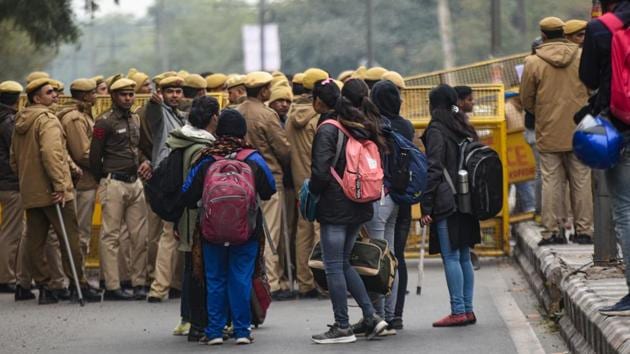 A group of masked men and women armed with sticks and rods unleashed violence on JNU students on Sunday evening.(Amal KS/Hindustan Times) A group of masked men and women armed with sticks and rods unleashed violence on JNU students on Sunday evening.(Amal KS/Hindustan Times)