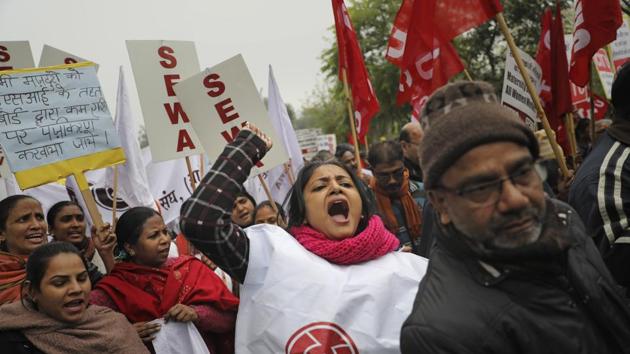 Delhi remained largely remained unaffected though most industrial workers stayed away from work. Metro and Delhi Transport Corporation (DTC) services were unaffected despite the strike call. Widespread intermittent rains in the national capital also reduced the intensity of the strike. The industrial areas of Mayapuri and Wazirabad saw a protest march. (Altaf Qadri / AP)