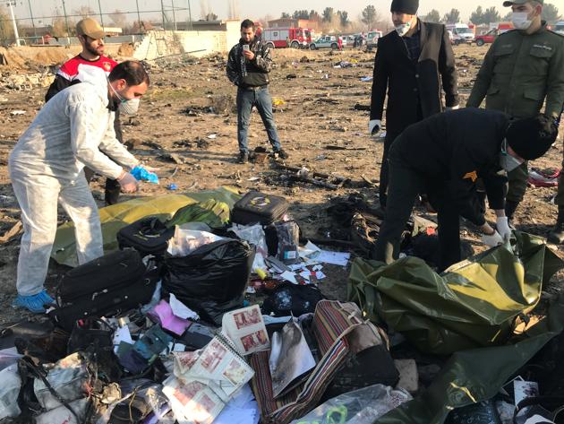 Passengers' belongings are seen after the Ukraine International Airlines plane crashed after take-off from Imam Khomeini airport, on the outskirts of Tehran, Iran, January 8, 2020.(REUTERS)