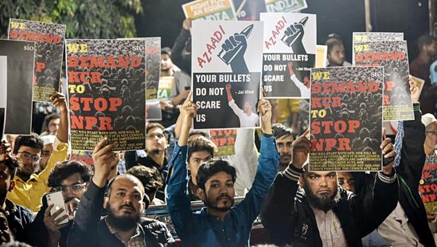 People hold placards during a protest against NRC and CAA, Osmania University Campus, Hyderabad(ANI)