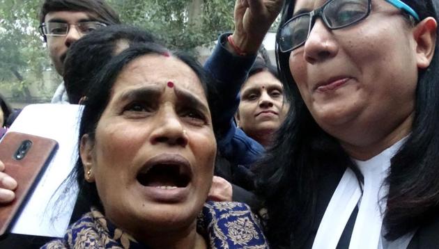 Asha Devi, mother of 2012 Delhi gang-rape victim along with lawyers after a court issued death warrants against the four convicts in the case, outside Patiala House Courts in New Delhi on January 7, 2020. (ANI Photo) Asha Devi, mother of 2012 Delhi gang-rape victim along with lawyers after a court issued death warrants against the four convicts in the case, outside Patiala House Courts in New Delhi on January 7, 2020. (ANI Photo)