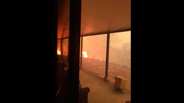 Fire approaches Helen Wong and Justin Lam’s home on December 21, 2019. It was clear that the family’s fortress had been breached and they were in mortal danger and needed to get out. “Once the fire had penetrated the structure, that was the signal: Time to get out. You can’t save it,” Lam said to AP. “Staying in any longer and we really would’ve been a statistic.” (Helena Wong via AP) Fire approaches Helen Wong and Justin Lam’s home on December 21, 2019. It was clear that the family’s fortress had been breached and they were in mortal danger and needed to get out. “Once the fire had penetrated the structure, that was the signal: Time to get out. You can’t save it,” Lam said to AP. “Staying in any longer and we really would’ve been a statistic.” (Helena Wong via AP)