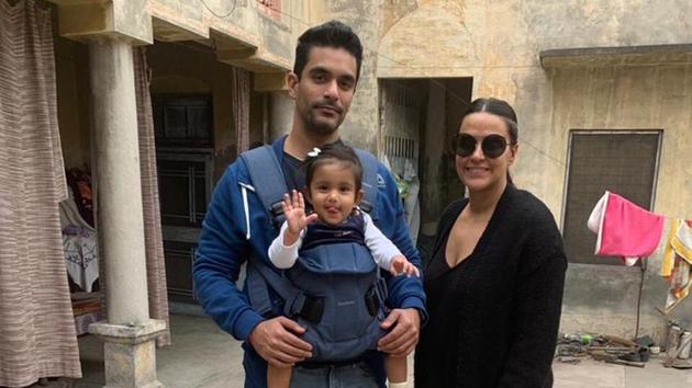 Angad Bedi, Neha Dhupia and their daughter Mehr at Bishan Singh Bedi’s ancestral home.