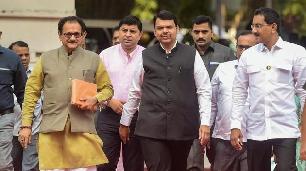 Former Maharashtra CM and Opposition leader Devendra Fadnavis arrives at the State Assembly in Mumbai, on Wednesday.(PTI Photo)