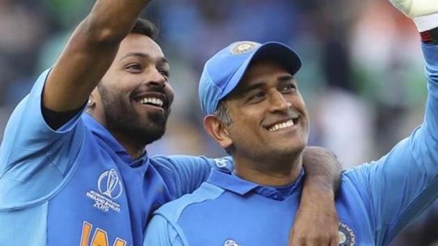 India's MS Dhoni, right, and Hardik Pandya wave towards the gallery.(AP)