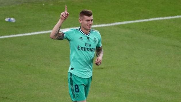 Soccer Football - Spanish Super Cup - Semi Final - Valencia v Real Madrid - King Abdullah Sports City, Jeddah, Saudi Arabia - January 8, 2020 Real Madrid's Toni Kroos celebrates scoring their first goal.(REUTERS)