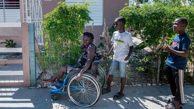 Mitile—who once worked in the capital—is dependent on handouts from neighbours. “The doctor told me that if I went to physical therapy, I might walk again, but you have to go into the city for that. You need money for public transport and I don’t have any,” she told AFP. “That’s how I have become even more handicapped than I was to begin with,” said Mitile, who has metal plates in her hip and spine. (Chandan Khanna/AFP) Mitile—who once worked in the capital—is dependent on handouts from neighbours. “The doctor told me that if I went to physical therapy, I might walk again, but you have to go into the city for that. You need money for public transport and I don’t have any,” she told AFP. “That’s how I have become even more handicapped than I was to begin with,” said Mitile, who has metal plates in her hip and spine. (Chandan Khanna/AFP)