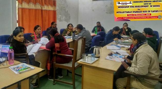 Experts busy in a workshop convened to develop books for intellectually disabled kids at ELTI-Prayagraj(HT file)