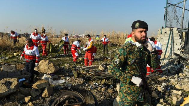 Rescue workers search the wreckage of a Boeing Co. 737-800 aircraft, operated by Ukraine International Airlines, which crashed shortly after takeoff near Shahedshahr, Iran. (Bloomberg) Rescue workers search the wreckage of a Boeing Co. 737-800 aircraft, operated by Ukraine International Airlines, which crashed shortly after takeoff near Shahedshahr, Iran. (Bloomberg)