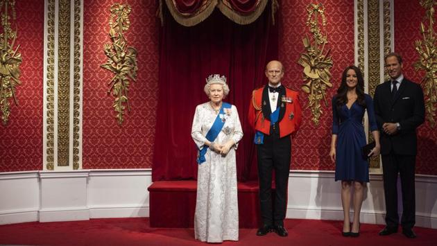 An empty space is left after the figures of Britain’s Prince Harry and Meghan, Duchess of Sussex, (L), were removed next to Queen Elizabeth II, Prince Philip and Prince William and Kate, Duchess of Cambridge, at Madame Tussauds in London, England. The royal couple’s announcement of trimming down their royal commitments in favour of a financially independent lifestyle has evoked sharp responses. (Victoria Jones / PA via AP) An empty space is left after the figures of Britain’s Prince Harry and Meghan, Duchess of Sussex, (L), were removed next to Queen Elizabeth II, Prince Philip and Prince William and Kate, Duchess of Cambridge, at Madame Tussauds in London, England. The royal couple’s announcement of trimming down their royal commitments in favour of a financially independent lifestyle has evoked sharp responses. (Victoria Jones / PA via AP)