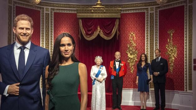 The figures of Britain's Prince Harry and Meghan, Duchess of Sussex, left, are moved from their original positions next to Queen Elizabeth II, Prince Philip and Prince William and Kate, Duchess of Cambridge, at Madame Tussauds in London, Thursday Jan. 9, 2020.(AP) The figures of Britain's Prince Harry and Meghan, Duchess of Sussex, left, are moved from their original positions next to Queen Elizabeth II, Prince Philip and Prince William and Kate, Duchess of Cambridge, at Madame Tussauds in London, Thursday Jan. 9, 2020.(AP)