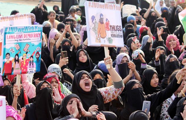 Demonstrators display placards and shout slogans to protest against the Citizenship Amendment Act(CAA), National Register of Citizens (NRC) 2019 and attacks on JNU students in Mumbai on January 9. (ANI) Demonstrators display placards and shout slogans to protest against the Citizenship Amendment Act(CAA), National Register of Citizens (NRC) 2019 and attacks on JNU students in Mumbai on January 9. (ANI)