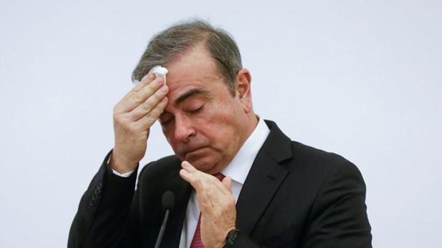 Former Nissan chairman Carlos Ghosn gestures during a news conference at the Lebanese Press Syndicate in Beirut, Lebanon.(REUTERS)