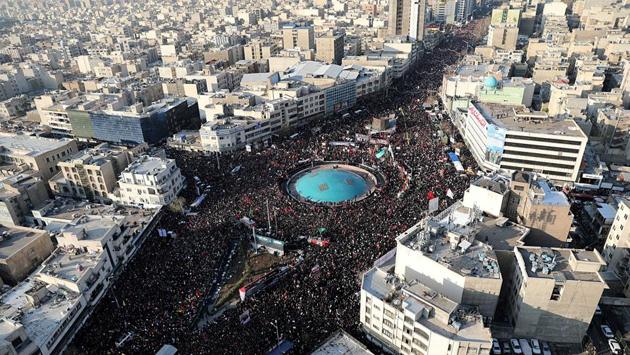 People attend a funeral procession for Iranian Major-General Qassem Soleimani, head of the elite Quds Force, killed in an air strike at Baghdad airport, in Tehran. Iran launched ballistic missiles into Iraq, hitting two US bases in retributive action described by the nation’s Supreme Leader Ayatollah Ali Khamein as “a slap” against America. (Official Khamenei website handout via REUTERS) People attend a funeral procession for Iranian Major-General Qassem Soleimani, head of the elite Quds Force, killed in an air strike at Baghdad airport, in Tehran. Iran launched ballistic missiles into Iraq, hitting two US bases in retributive action described by the nation’s Supreme Leader Ayatollah Ali Khamein as “a slap” against America. (Official Khamenei website handout via REUTERS)