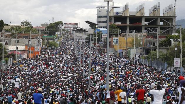 A protest over corruption, inflation and scarcity of basic goods in Port-au-Prince last October. Since the middle of 2018, regular demonstrations have called for more transparency in how the funds from Venezuela’s Petrocaribe program were handled.The scheme had allowed Haiti to buy petroleum products cheaply and on credit, but it was plagued by allegations of misuse of aid money allocated by Caracas. (Rebecca Blackwell/AP) A protest over corruption, inflation and scarcity of basic goods in Port-au-Prince last October. Since the middle of 2018, regular demonstrations have called for more transparency in how the funds from Venezuela’s Petrocaribe program were handled.The scheme had allowed Haiti to buy petroleum products cheaply and on credit, but it was plagued by allegations of misuse of aid money allocated by Caracas. (Rebecca Blackwell/AP)