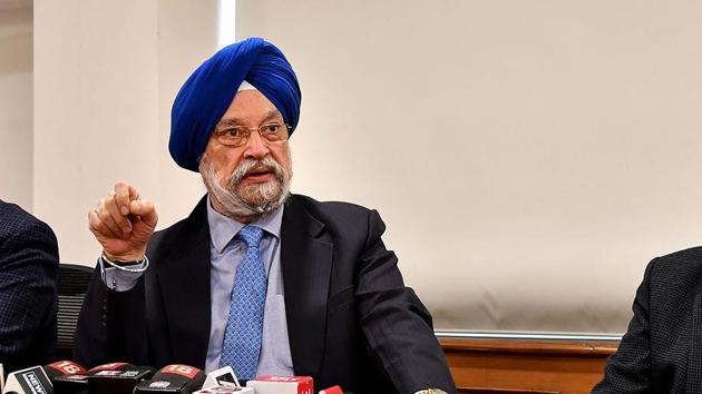 Minister of State for Housing & Urban Affairs, Civil Aviation (Independent Charge) and Commerce & Industry Hardeep Singh Puri addresses a press conference, in New Delhi.(PTI)