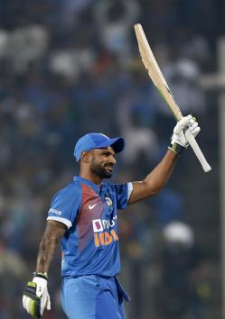 India's Shikhar Dhawan celebrates his fifty. (AP)