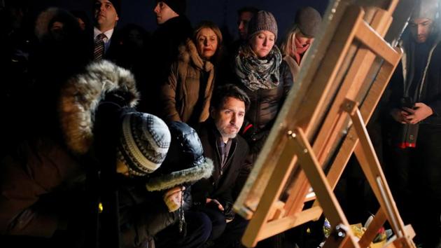Canada's Prime Minister Justin Trudeau attends a candle light vigil for the victims of Ukraine International Airlines flight PS-752 on Parliament Hill in Ottawa, Ontario, on January 9, 2020.(REUTERS Photo)