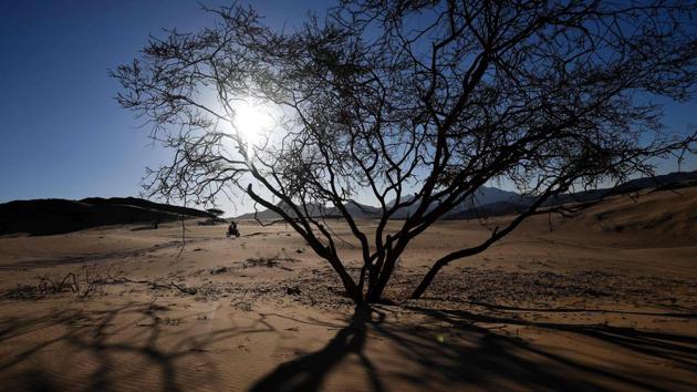 A biker competes during Stage 1 of the Dakar 2020 rally between Jeddah and Al Wajh, Saudi Arabia. (Franck Fife / AFP) A biker competes during Stage 1 of the Dakar 2020 rally between Jeddah and Al Wajh, Saudi Arabia. (Franck Fife / AFP)