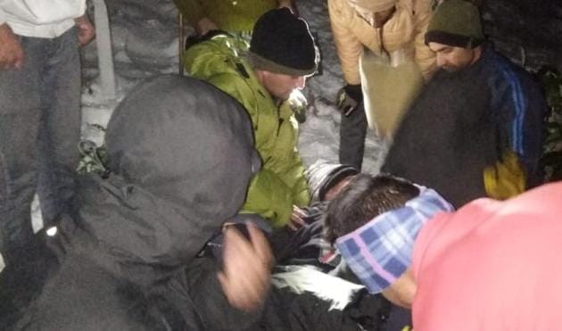 A team of State Disaster Response Force (SDRF) rescuing the students trapped in snow in Uttarkashi. (SDRF Photo) A team of State Disaster Response Force (SDRF) rescuing the students trapped in snow in Uttarkashi. (SDRF Photo)
