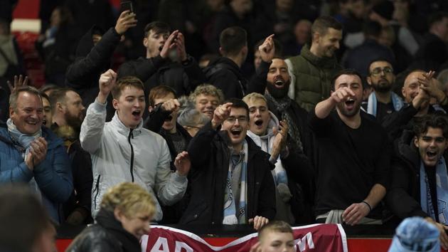 Manchester City fans celebrate after the end of the English League Cup semifinal first leg match (Representational image) (AP) Manchester City fans celebrate after the end of the English League Cup semifinal first leg match (Representational image) (AP)