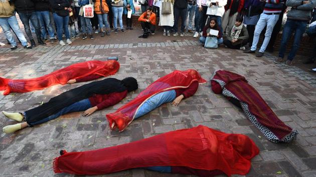 Delhi University students perform a street play as part of a protest in solidarity with the students of JNU and Jamia Millia Islamia against the recent violence in university campuses, at Arts Faculty on Thursday. (Sanchit Khanna / HT Photo) Delhi University students perform a street play as part of a protest in solidarity with the students of JNU and Jamia Millia Islamia against the recent violence in university campuses, at Arts Faculty on Thursday. (Sanchit Khanna / HT Photo)