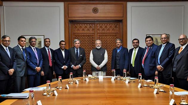 Prime Minister Narendra Modi poses for a group photo with Reliance Industries chairman Mukesh Ambani, Tata Group patriarch Ratan Tata, Business tycoon Anand Mahindra and others during an interaction with business stalwarts .(PTI)