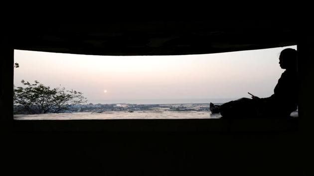 A person waits to watch the sunset at a former military observation post in Leidishan Natural Park, Kaohsiung. The threat from China, which claims democratic Taiwan as its own to be brought under Beijing’s rule by force if needed, has not gone away but the ageing bunkers are no longer needed for defence purposes. (Ann Wang / REUTERS) A person waits to watch the sunset at a former military observation post in Leidishan Natural Park, Kaohsiung. The threat from China, which claims democratic Taiwan as its own to be brought under Beijing’s rule by force if needed, has not gone away but the ageing bunkers are no longer needed for defence purposes. (Ann Wang / REUTERS)