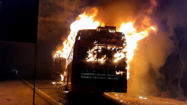 A bus carrying 50 passengers catches fire after collision with a truck on GT Road, in Kannauj on Saturday. (ANI Photo) A bus carrying 50 passengers catches fire after collision with a truck on GT Road, in Kannauj on Saturday. (ANI Photo)