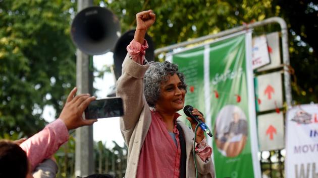 Author Arundhati Roy raises slogans during a protest outside Jamia Millia Islamia against the Citizenship (Amendment) Act (CAA) and the National Register of Citizens (NRC), in New Delhi. (Amal KS/HT Photo)