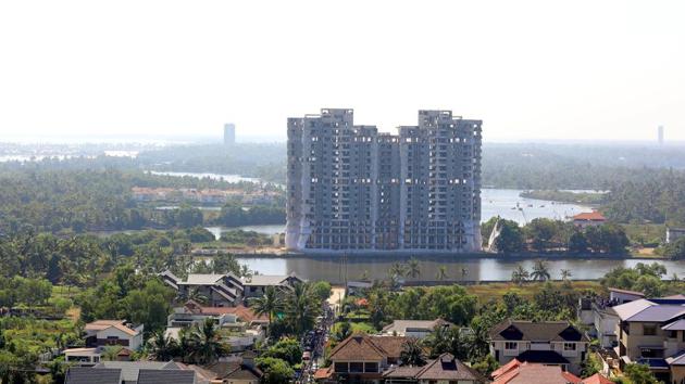 The Supreme Court had ordered the demolition of these four flats with more than 350 houses in May last year. The Kerala government informed the Supreme Court on Monday about the demolition of the four towers.  (Vivek R Nair/HT Photo) 