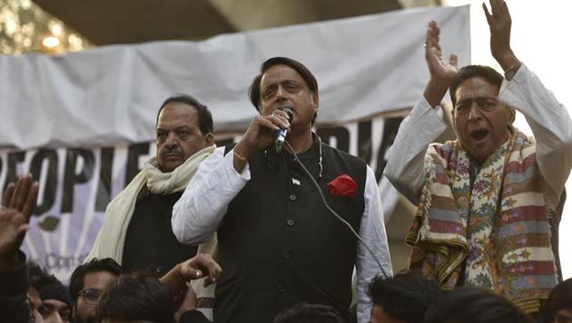Congress MP Shashi Tharoor speaks during a demonstration against Citizenship (Amendment) Act, outside Jamia Milia Islamia University in New Delhi on Sunday.(Burhaan Kinu/HT PHOTO)