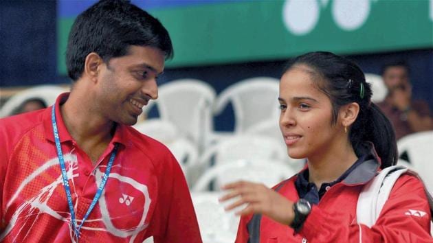 File image of Saina Nehwal with Pullela Gopichand. (PTI) File image of Saina Nehwal with Pullela Gopichand. (PTI)