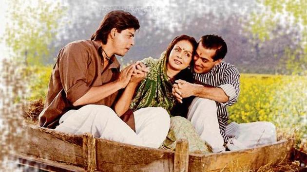 Shah Rukh Khan and Salman Khan with Rakhee in a still from Karan Arjun.