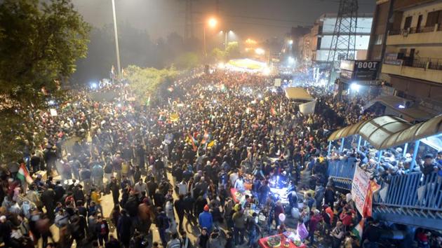 Thousands gathered at Shaheen Bagh on Sunday where the protesters also took out a flag march against the amended citizenship law and the NRC.(PTI Photo)