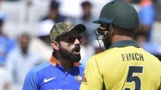 File image: India captain Virat Kohli has a heated exchange with Australia's skipper Aaron Finch.(PTI)