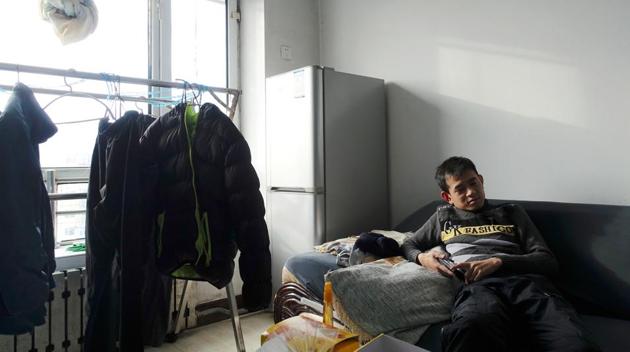 Ship mechanic Li Hai, 32, inside his flat during an interview with Reuters, in the coal city of Hegang, Heilongjiang province, northeast China. Li is a nobody in the country. But he became a minor internet sensation last month after posting a video of his everyday life in the largely forgotten coal city in the country’s far north. The country’s declining economy is driving some youth to settle in cities like Hegang. (Ryan Woo / REUTERS) Ship mechanic Li Hai, 32, inside his flat during an interview with Reuters, in the coal city of Hegang, Heilongjiang province, northeast China. Li is a nobody in the country. But he became a minor internet sensation last month after posting a video of his everyday life in the largely forgotten coal city in the country’s far north. The country’s declining economy is driving some youth to settle in cities like Hegang. (Ryan Woo / REUTERS)