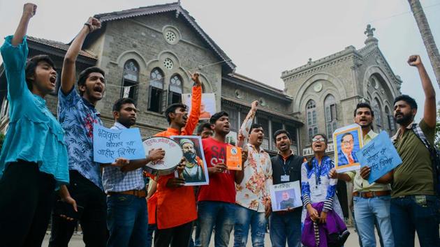 Students from Fergusson College carried out a protest against the book 'Aaj Ke Shivaji - Narendra Modi' in Pune, India, on Monday, January 13, 2020.(Milind Saurkar/HT Photo)