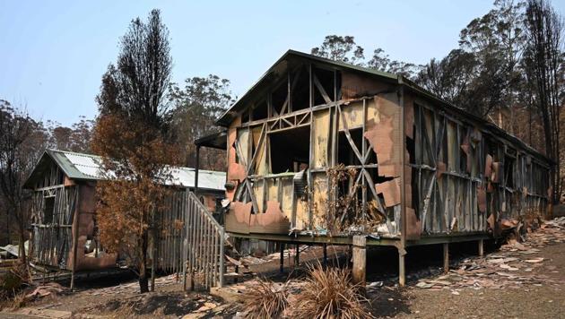 Accommodation blocks at the Gold Rush Colony in Mogo, a tourist attraction dedicated to Mogo's 1850s gold rush -- where a recent bushfire reduced it to twisted metal and ash. The unprecedented scale of Australia's bushfires have tainted the country's reputation as a safe and alluring holiday destination. (Holly Robertson / AFP) Accommodation blocks at the Gold Rush Colony in Mogo, a tourist attraction dedicated to Mogo's 1850s gold rush -- where a recent bushfire reduced it to twisted metal and ash. The unprecedented scale of Australia's bushfires have tainted the country's reputation as a safe and alluring holiday destination. (Holly Robertson / AFP)