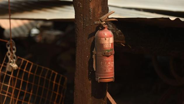 An unused fire extinguisher in the remains of a building at the Gold Rush Colony. Thousands of tourists were evacuated from coastal towns, international visitors have cancelled flights, and the US State Department even upgraded its security advice for Australia -- warning travellers to "exercise increased caution" due to the bushfire risk. (Holly Robertson / AFP) An unused fire extinguisher in the remains of a building at the Gold Rush Colony. Thousands of tourists were evacuated from coastal towns, international visitors have cancelled flights, and the US State Department even upgraded its security advice for Australia -- warning travellers to "exercise increased caution" due to the bushfire risk. (Holly Robertson / AFP)