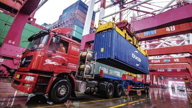 In a further sign of de-escalation, Washington on Tuesday removed the currency manipulator label it imposed on China in summer. (AP) In a further sign of de-escalation, Washington on Tuesday removed the currency manipulator label it imposed on China in summer. (AP)