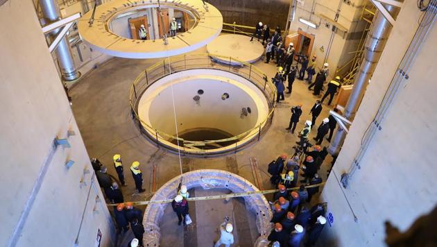 In this Dec. 23, 2019 file photo released by the Atomic Energy Organization of Iran, technicians work at the Arak heavy water reactor's secondary circuit, as officials and media visit the site, near Arak, Iran. (AP file photo) In this Dec. 23, 2019 file photo released by the Atomic Energy Organization of Iran, technicians work at the Arak heavy water reactor's secondary circuit, as officials and media visit the site, near Arak, Iran. (AP file photo)