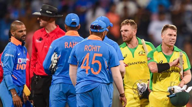 Australian batsman David Warner and Aaron Finch being congratulated. (PTI) Australian batsman David Warner and Aaron Finch being congratulated. (PTI)